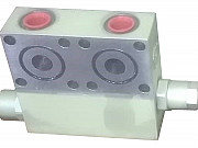 Блок гидроклапанов БПКИ привода поворотной платформы автокрана Москва